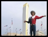 Big Tex standing in front of the tower building was welcoming everyone to the fair
